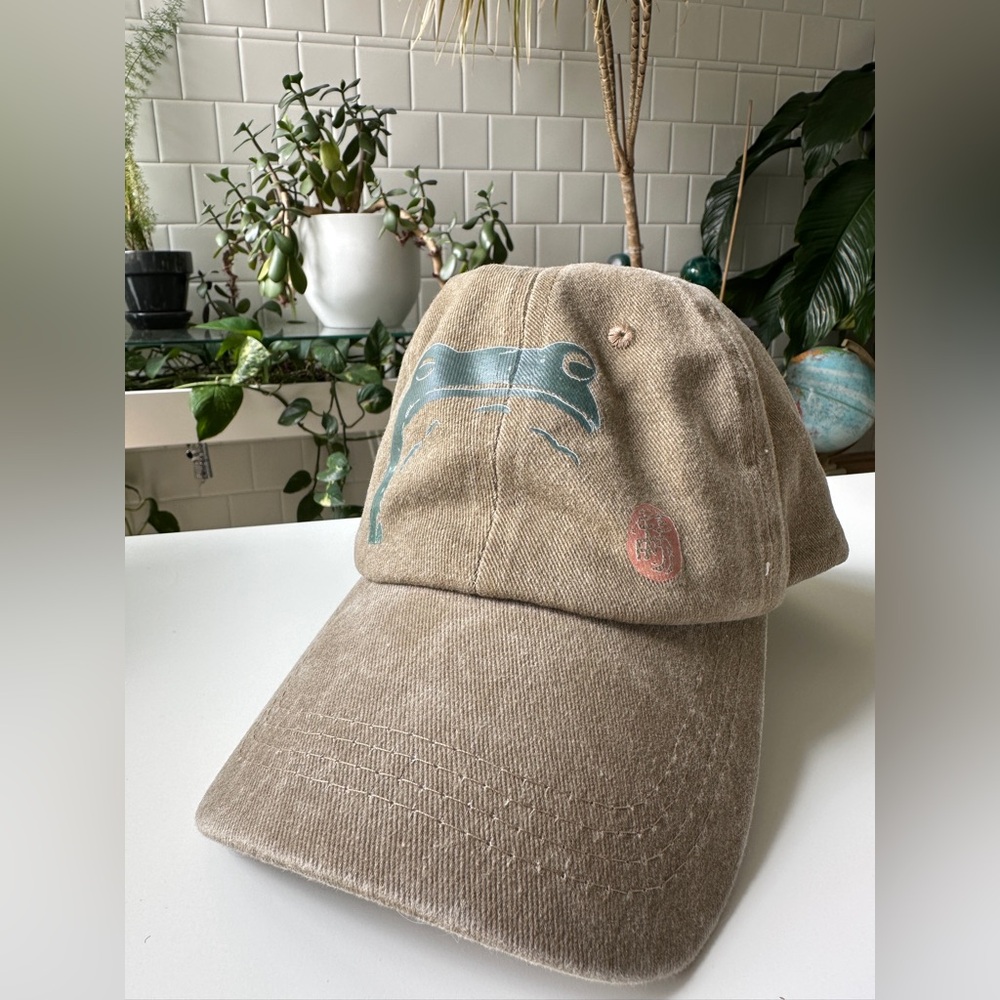 Matsumoto Hoji Sad Frog Tan and Green Casual Hat with Curved Brim - Adjustable